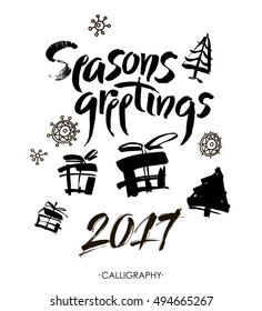 Season's greetings. Christmas calligraphy. Handwritten modern brush lettering. Hand drawn design elements. Vector.