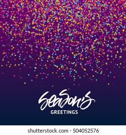 Season's Greetings Christmas and New Year greeting card. Handwritten brush lettering. Colorful confetti background.