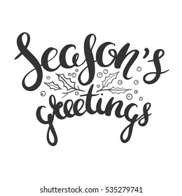 Seasons greetings hand drawn in calligraphy. Vector lettering isolated on white. Handwritten Christmas greetings with mistletoe doodles.