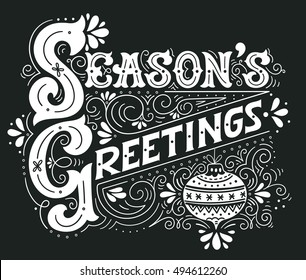 Seasons greetings. Hand drawn winter holiday drawing. Lettering with a Christmas ball and decorative design elements. This illustration can be used as a greeting card, poster or print.