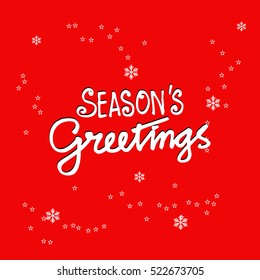 Seasons greetings. Hand lettering calligraphic inscription by brush. 
