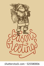 season's greetings vintage  rubber stamp card. old paper. old fashioned santa drawing.