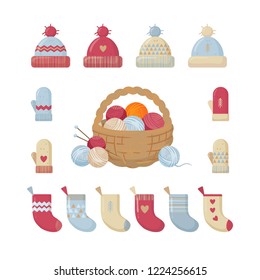 Season's knitted accessories set. Hats, mittens, socks and basket with colorful balls of yarn