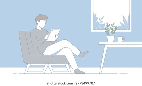 Seated male reader using a tablet while relaxed and focused