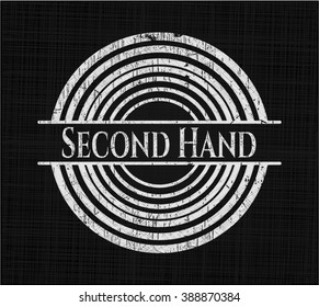 Emblema de pizarra de segunda mano escrito en la pizarra