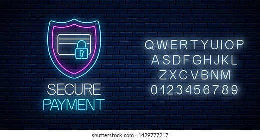 Secure payment glowing neon sign with alphabet on dark brick wall background. Payment protection symbol with shield and credit card with lock. Vector illustration.