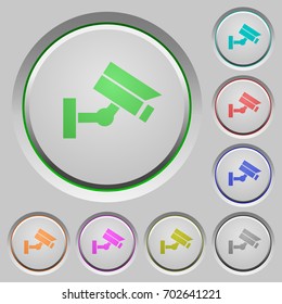 Security camera color icons on sunk push buttons