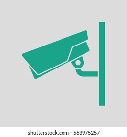 Security camera icon. Gray background with green. Vector illustration.
