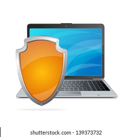 Security concept. Shield antivirus and laptop