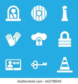 Security icons set. set of 9 security filled icons such as airport officer, lighthouse, gloves, lock, cone, badge, shield, key