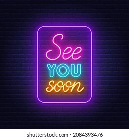 See You Soon neon lettering on brick wall background.