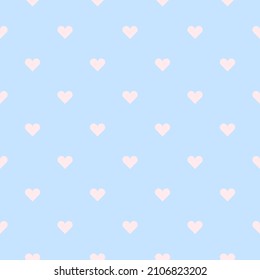 Segamless pattern of pink hearts on a blue pastel backround. Happy Valentine's Day concept.