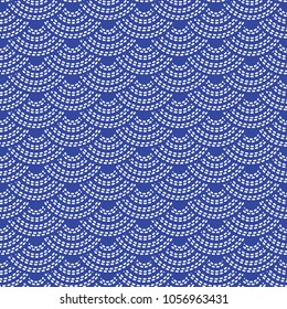 Seigaiha literally means wave of the sea. seamless pattern abstract scales simple Nature background japanese circle Blue white colors. Vector