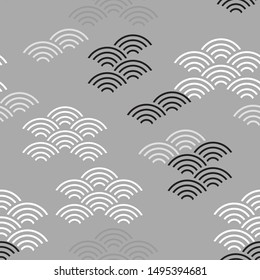 Seigaiha literally means wave of the sea. seamless pattern abstract scales simple Nature background japanese circle Black white gray colors. Can be used for Gift wrap, fabrics, wallpapers. Vector 