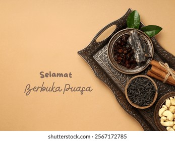 "Selamat Berbuka Puasa" - A feast for the senses! Dates, tea, and spices await to break the fast.