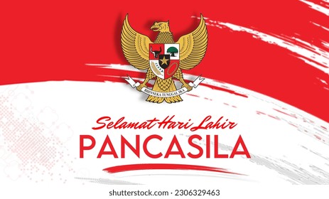 Selamat hari pancasila means Happy Pancasila Day, the symbol of the Republic of Indonesia. Hand holding Garuda Pancasila emblem Isolated on white background. Indonesia pancasila day concept