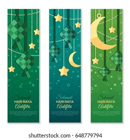 Selamat Hari Raya Aidilfitri vertical banners. Vector illustration. Hanging ketupat and crescent with stars, garlands on green background. Caption: Fasting Day of Celebration