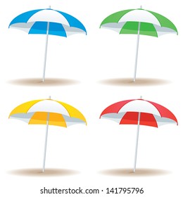 A selection of beach umbrellas in basic colors isolated on white.