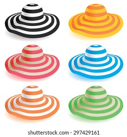 A selection of floppy beach hats in various colors.