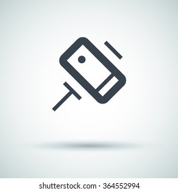 a self mobile phone in a holder self isolated minimal single flat linear icon in color. Line vector icon for websites and mobile minimalistic flat design.
