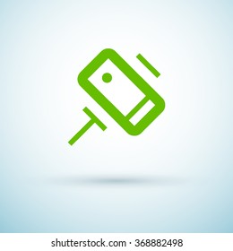 a self mobile phone in a holder self isolated minimal single flat linear icon in color. Line vector icon for websites and mobile minimalistic flat design.
