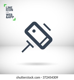 a self mobile phone in a holder self isolated minimal single flat linear icon in color. Line vector icon for websites and mobile minimalistic flat design.