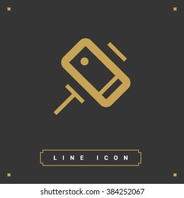 a self mobile phone in a holder self isolated minimal single flat linear icon in color. Line vector icon for websites and mobile minimalistic flat design.