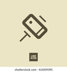 a self mobile phone in a holder self isolated minimal single flat linear icon in color. Line vector icon for websites and mobile minimalistic flat design.