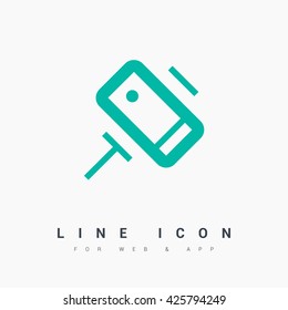 a self mobile phone in a holder self isolated minimal single flat linear icon in color. Line vector icon for websites and mobile minimalistic flat design.