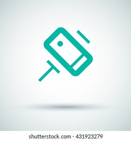 a self mobile phone in a holder self isolated minimal single flat linear icon in color. Line vector icon for websites and mobile minimalistic flat design.