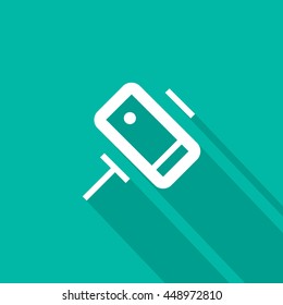 a self mobile phone in a holder self isolated minimal single flat linear icon in color. Line vector icon for websites and mobile minimalistic flat design.