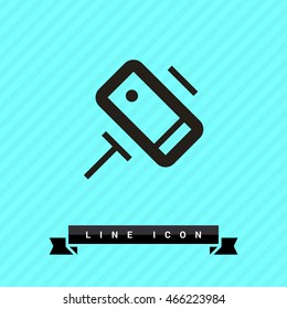 a self mobile phone in a holder self isolated minimal single flat linear icon in color. Line vector icon for websites and mobile minimalistic flat design.