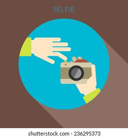 Selfie concept. Hand of person taking photo using camera. Flat design style
