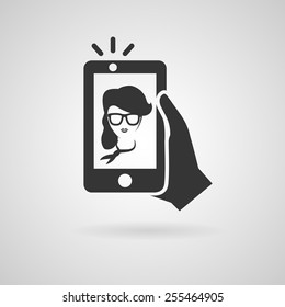 Selfie icon. Trendy woman taking a self portrait on smart phone. Vector illustration. 