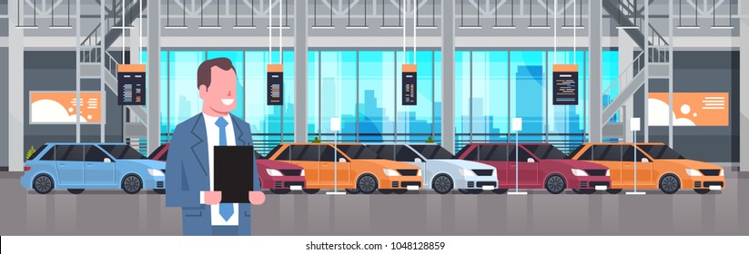 Seller Man In Cars Dealership Center Showroom Interior Over Set Of New Modern Vechicles Horizontal Banner