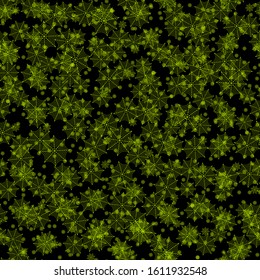 Semless abstract pattern of yellow snowflakes on black. Vector repeating background of web for print, textile, fashion, scrapbooking, cover, backdrop, wallpaper, wrapping  design.