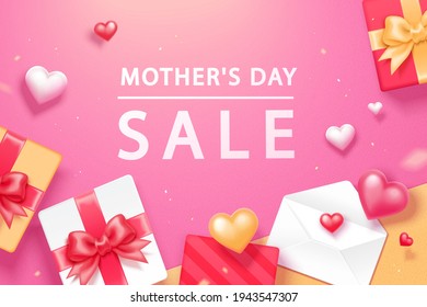 Sending love to mothers with gift boxes and card as celebration for the holiday. Designed on pink color background top view