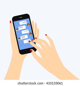 Sending messages to friends via instant messaging. Female hand holding a smartphone with a chat on the display