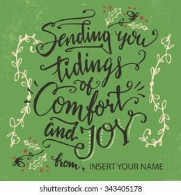 Sending you tidings of comfort and joy. Christmas and New Year greeting card, holiday calligraphy in vintage style. Insert your name below