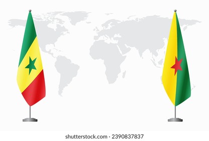 Senegal and French Guiana flags for official meeting against background of world map.