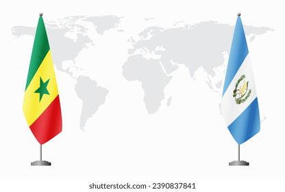 Senegal and Guatemala flags for official meeting against background of world map.