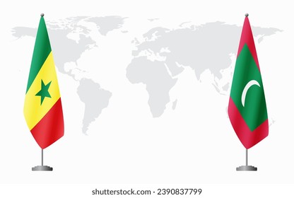 Senegal and Maldives flags for official meeting against background of world map.