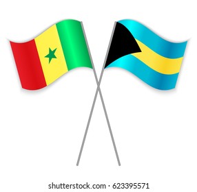 Senegalese and Bahamian crossed flags. Senegal combined with Bahamas isolated on white. Language learning, international business or travel concept.