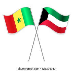 Senegalese and Kuwaiti crossed flags. Senegal combined with Kuwait isolated on white. Language learning, international business or travel concept.