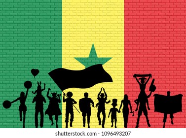 Senegalese supporter silhouette in front of brick wall with Senegal flag. All the objects, silhouettes and the brick wall are in different layers. 