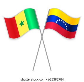 Senegalese and Venezuelan crossed flags. Senegal combined with Venezuela isolated on white. Language learning, international business or travel concept.
