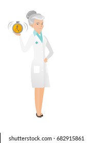 Senior caucasian doctor in medical gown showing ringing alarm clock. Full length of doctor with alarm clock. Doctor holding alarm clock. Vector flat design illustration isolated on white background.
