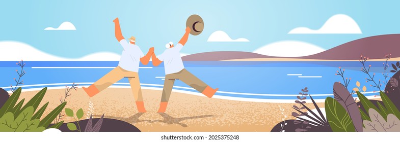 senior couple dancing old man and woman having fun active old age concept seascape background