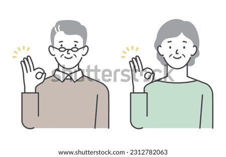Senior couple doing OK pose male female