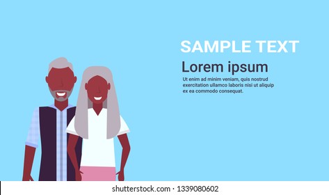 senior couple embracing together happy african american grandparents mature old man and woman in love male female characters portrait flat horizontal blue background copy space